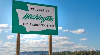 A roadside welcome to Washington State, the Evergreen State.