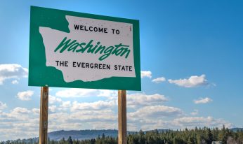 A roadside welcome to Washington State, the Evergreen State.