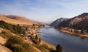 Several anglers spey casting on the river,  located in Idaho.